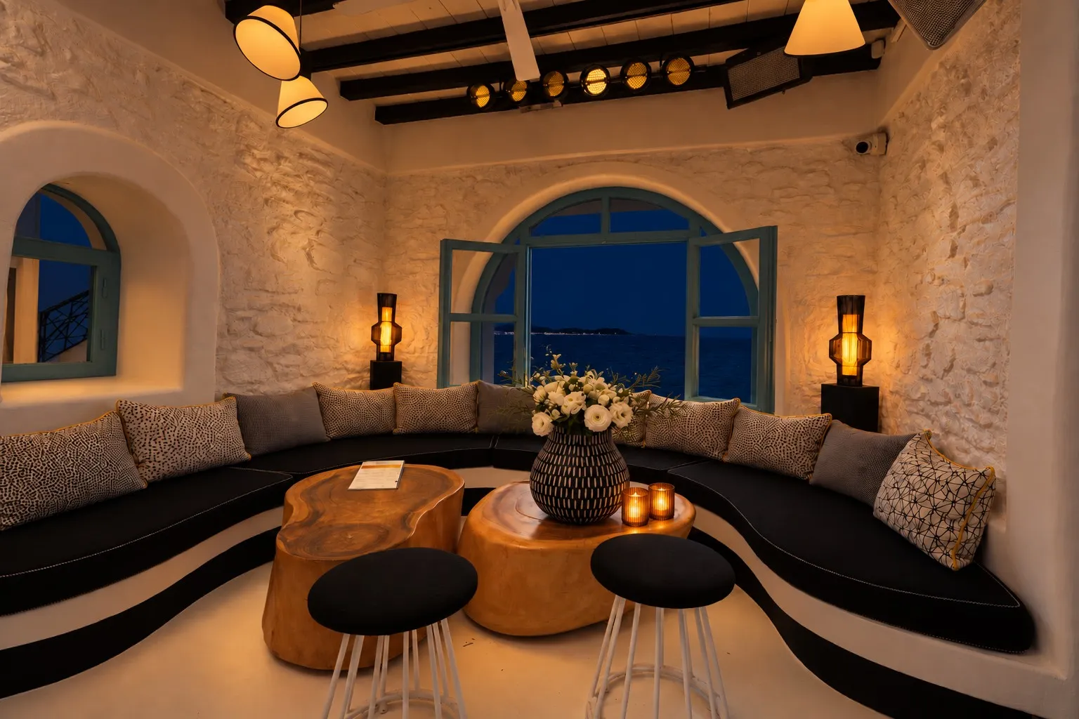 The Rotonda Table lit in colour at night